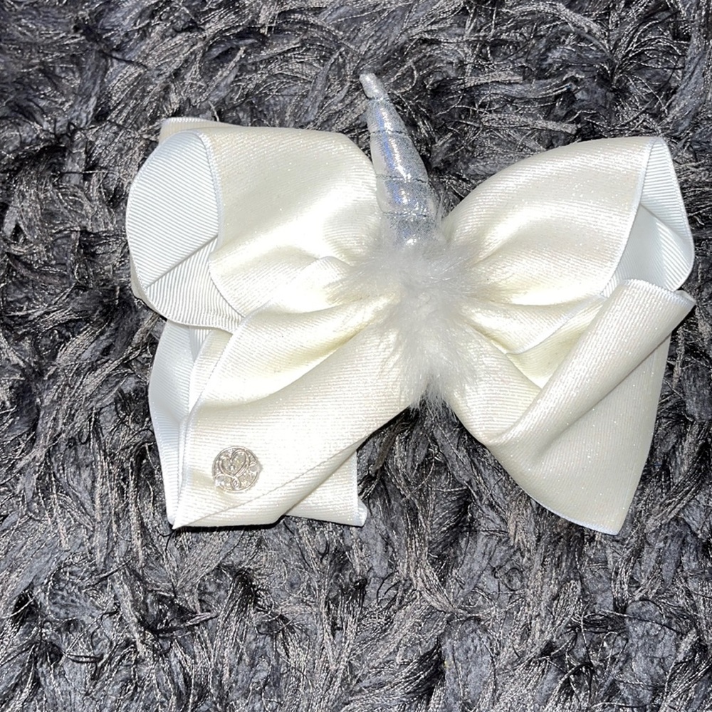 White glitter unicorn Jojo Siwa bow and Never used!